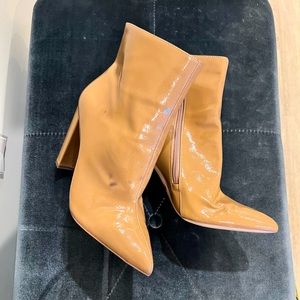 Nude pointed toe ankle bootie